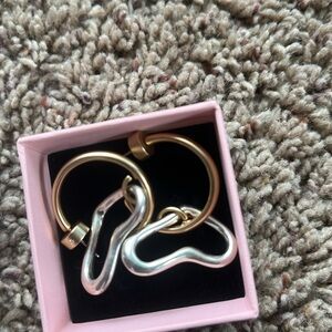 Mixed metal drop heart earrings